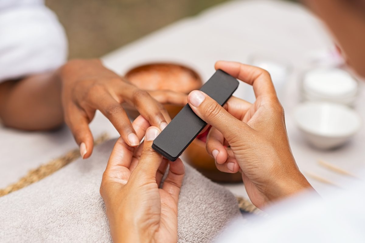 Nail caring. nail file. buffing nails.