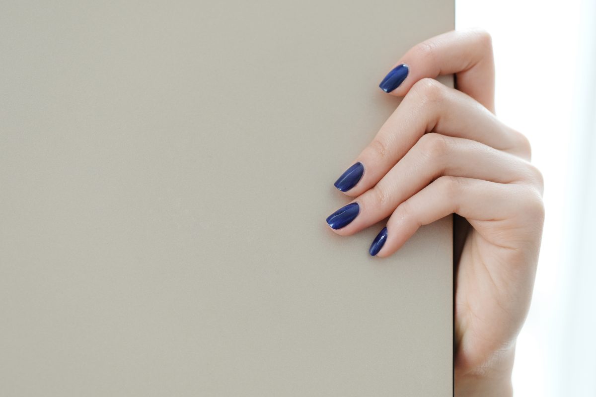 2025 Nail Color Trends.. Beauty. Female fingers in close-up