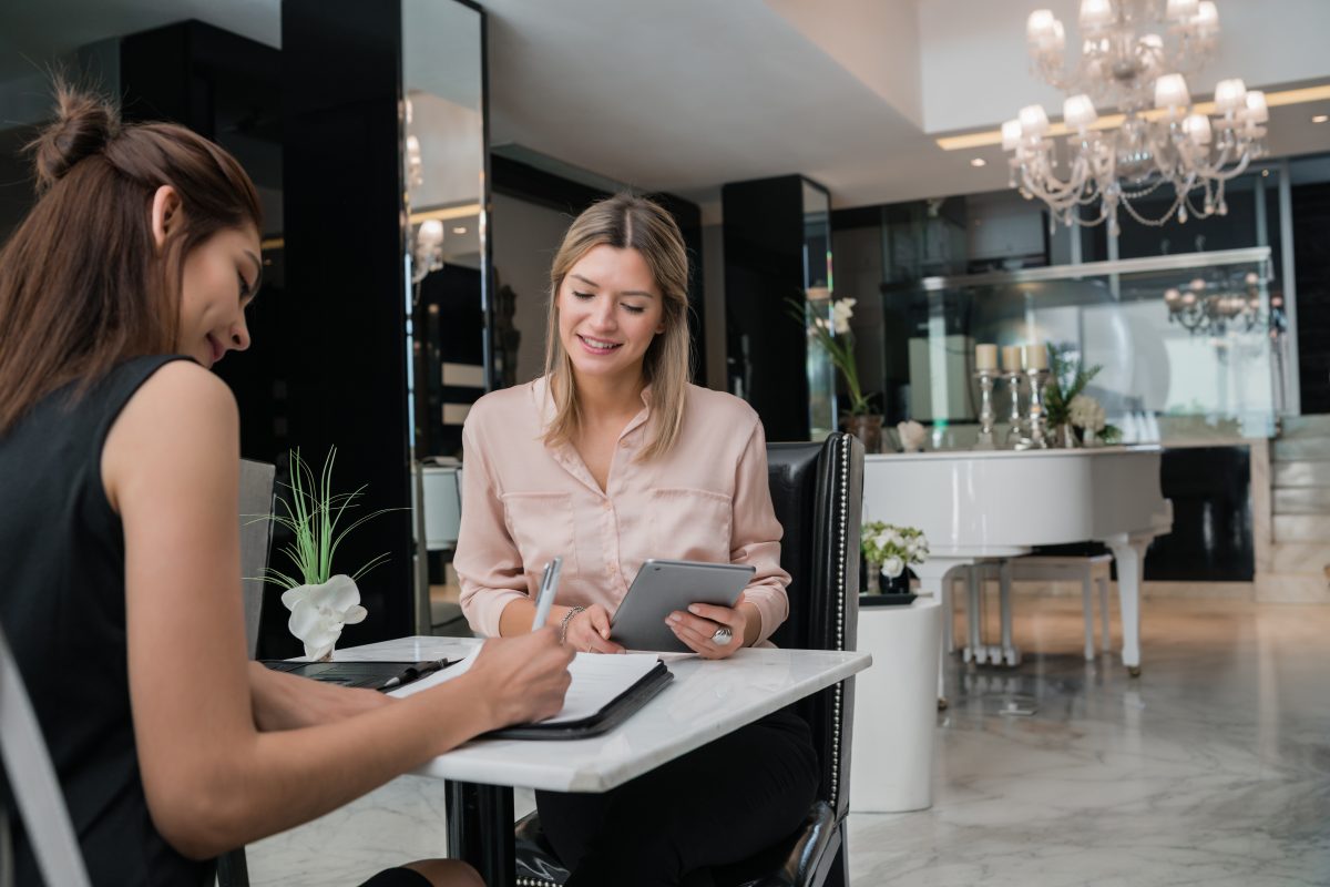Two businesswomen having meeting