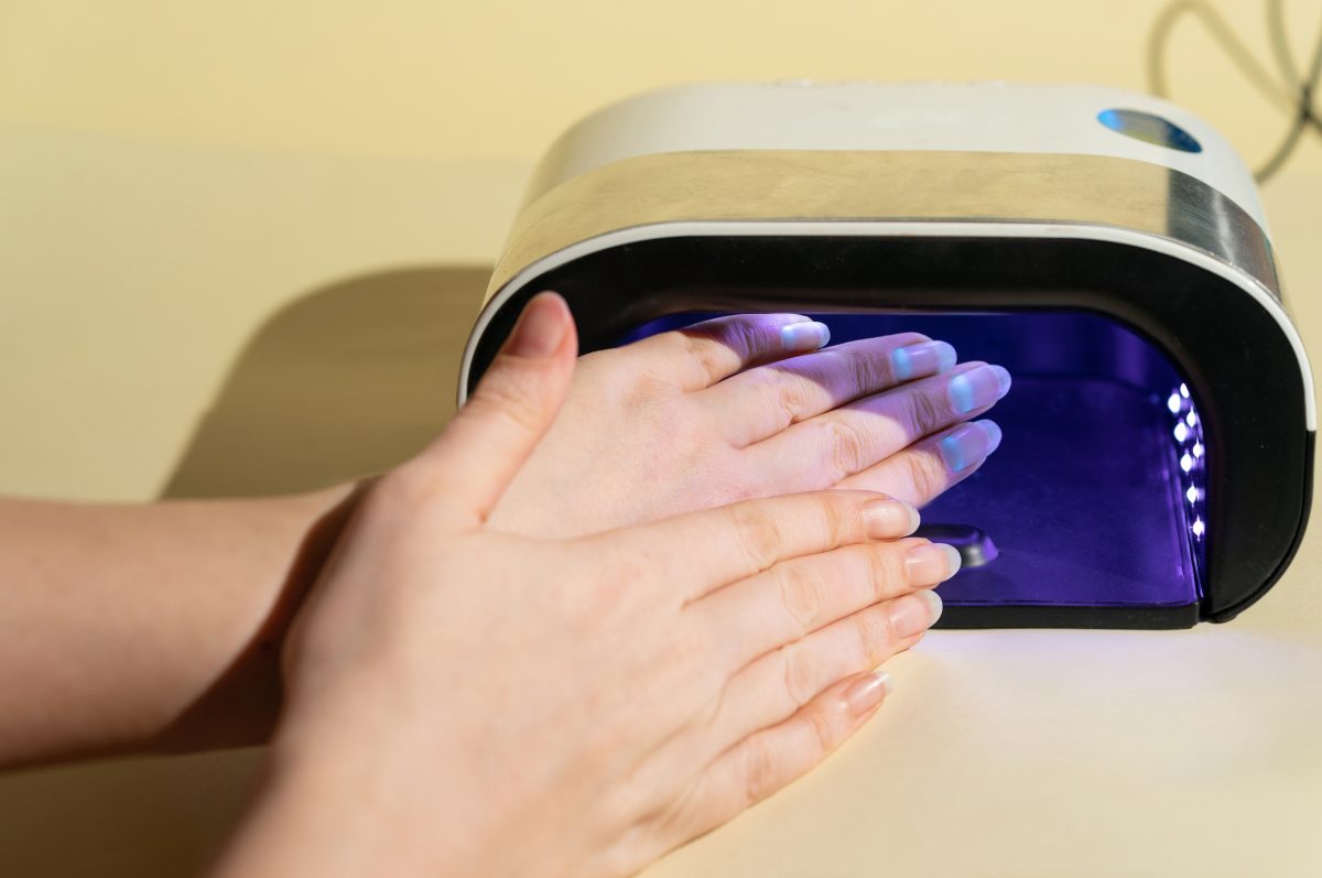 Curing gel nail polish. Manicure. LED nail lamp