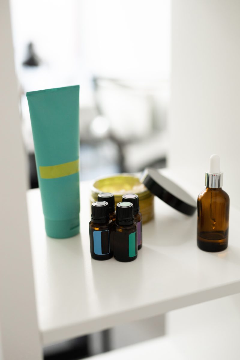 Close up of body care cosmetic products on shelf in cosmetology. Spa and piling cosmetics.